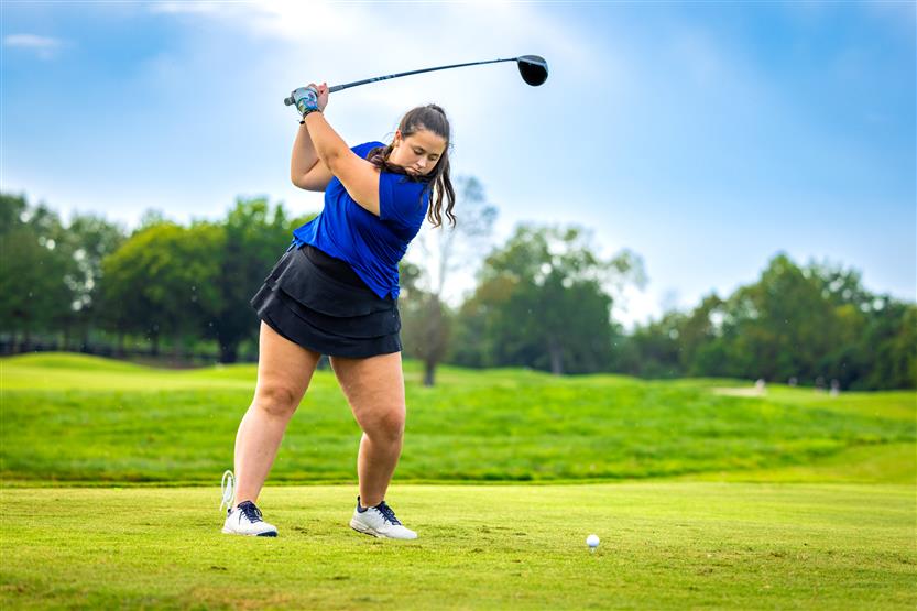 Students play golf